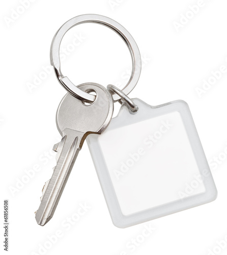 one house key and square keychain on ring