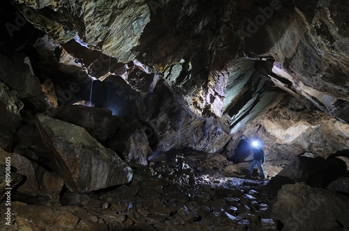 Caver in a cave, Pugnetto, Mezzenile, Piedmont, Italy