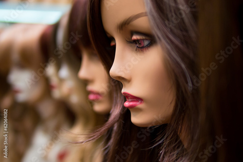 mannequins in a wig shop