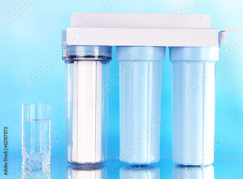 Filter system for water treatment on blue background