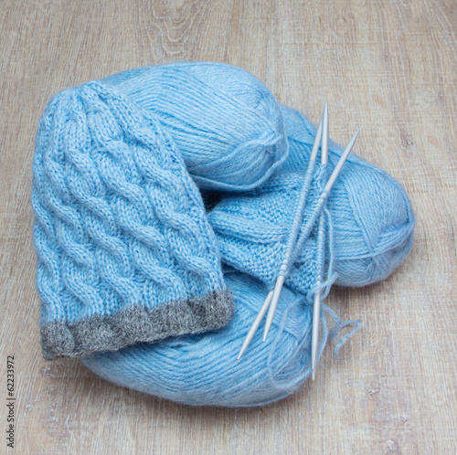 knitted cap and blue yarn