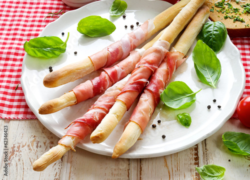 Grissini with prosciutto crudo