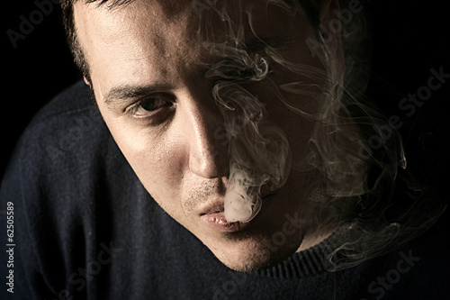 Portrait of smoking man