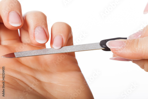 Hands with nailfile