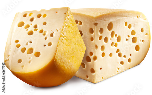 Two pieces of Emmental cheese head.