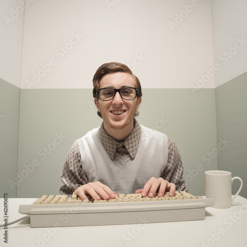 Vintage nerd on computer