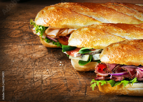 Three tasty baguettes with savory fillings