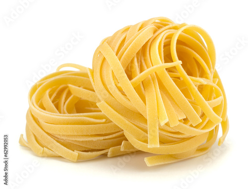 Italian egg pasta nest isolated on white background