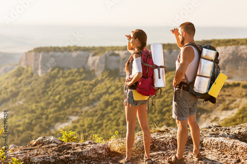Hikers - people hiking, man looking at mountain nature landscape