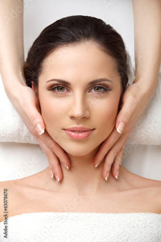 close up of woman in spa salon getting face treatment