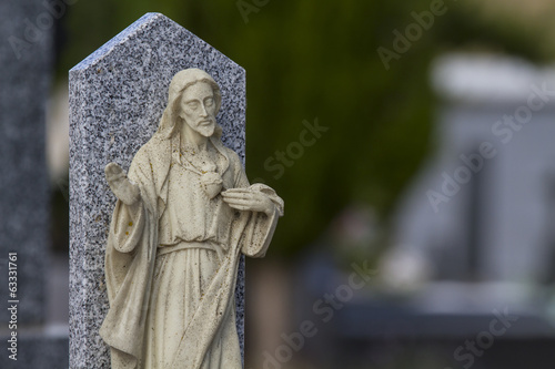 Cemetery detail with stone sculpture