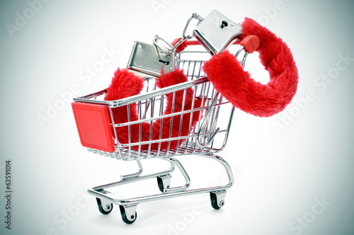 sexy fluffy handcuffs in a shopping kart