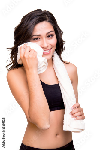 Woman wiping sweat with towel