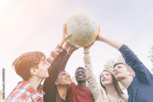 Group of Teenagers Holding World Globe Map