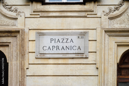 Capranica Square, street plate on a wall in Rome, Italy