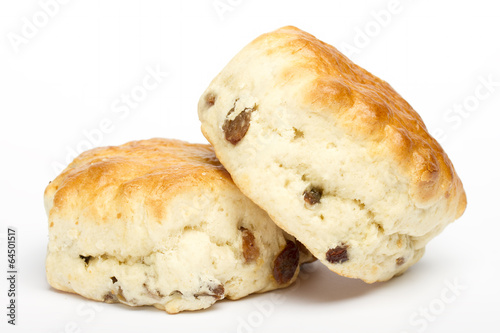 Two fruit scones on a white background