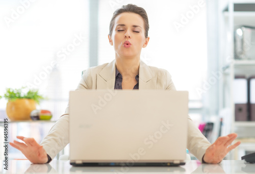 Business woman with laptop relaxing