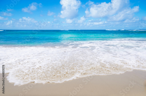 Wave on the sandy beach