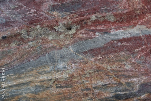 Surface of natural stone - crimson quartzite porphyry