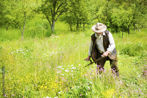 Man with scythe