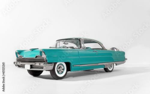 old green, classic vintage car on white isolated background