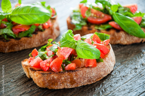 Italian tomato bruschetta with chopped vegetables