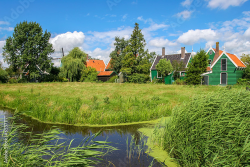 Small creek and rural houses in Dutch village.