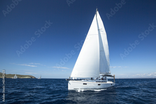 Boat in sailing regatta. Luxury yachts.