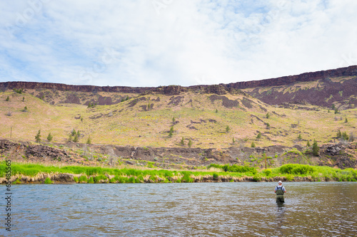 Fly Fisherman Casting on the Deschutes River