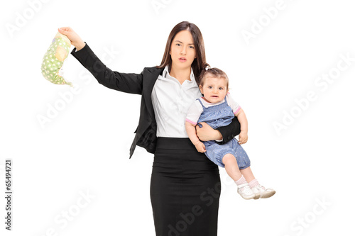 Young mother holding her baby and stinky diaper