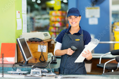 female cashier at hardware store