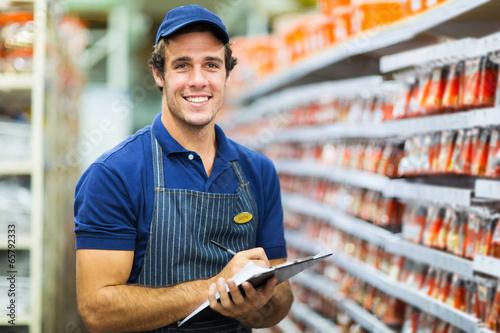 hardware shop storekeeper counting stock