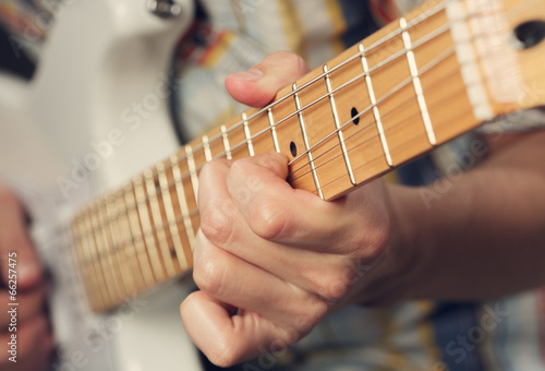 Guitarist playing an electric guitar