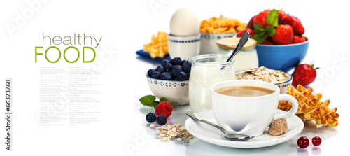 Healthy breakfast - yogurt, coffee, muesli and berries
