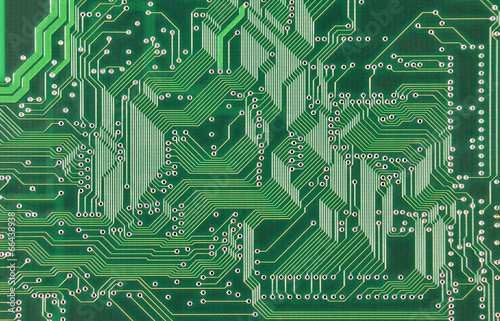 Close up of a printed green computer circuit board