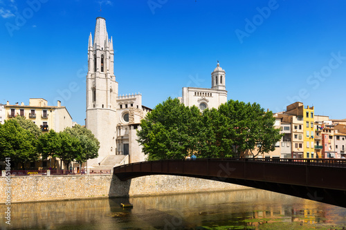 Bridge over river with Collegiate Church and Gothic Cathedral