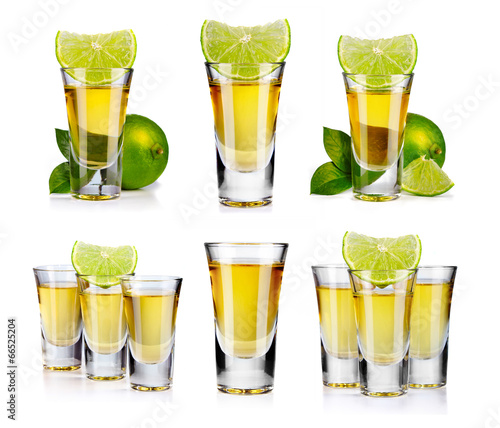 Set of gold tequila shot with lime fruits isolated
