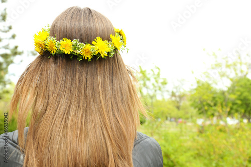 Female hair with crown of dandelions