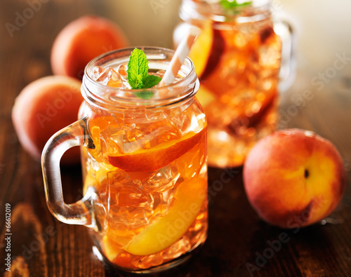 jar of peach tea shot with selective focus