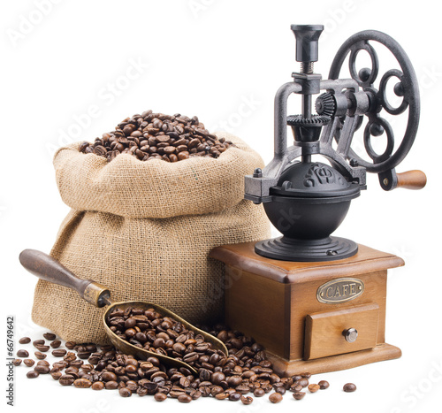 sack of coffee beans with retro grinder isolated on white