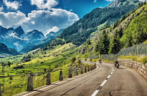 Group of bikers touring European Alps