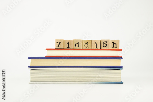 yiddish language word on wood stamps and books