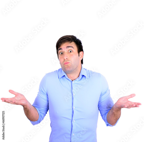 Portrait of confused clueless young man against white background