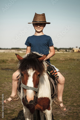 Little kid with pony