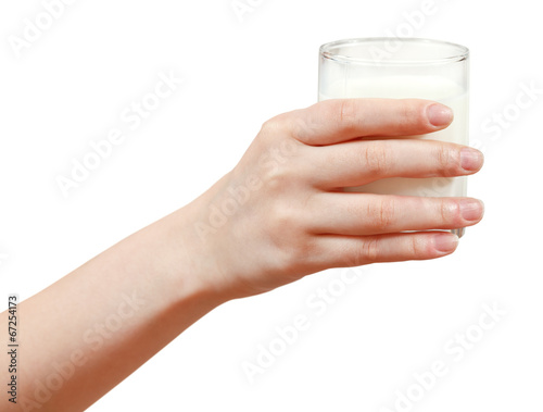 hand holding glass of milk isolated