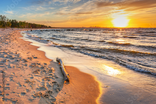 Sunset on the beach at Baltic Sea in Poland