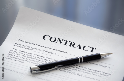 Pen on the contract papers