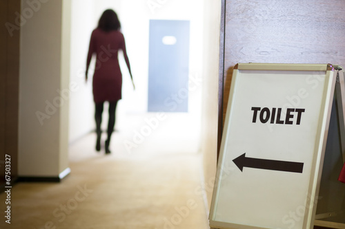 woman going to toilet