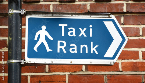 Signpost points to a taxi rank