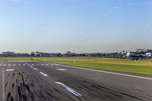 touchdown area with tire marks on a runway